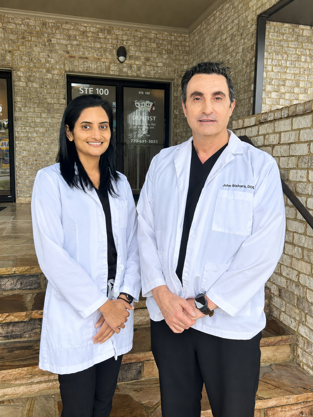 Dr. Milli Patel and Dr. John Bishara outside Merchants Walk Dental